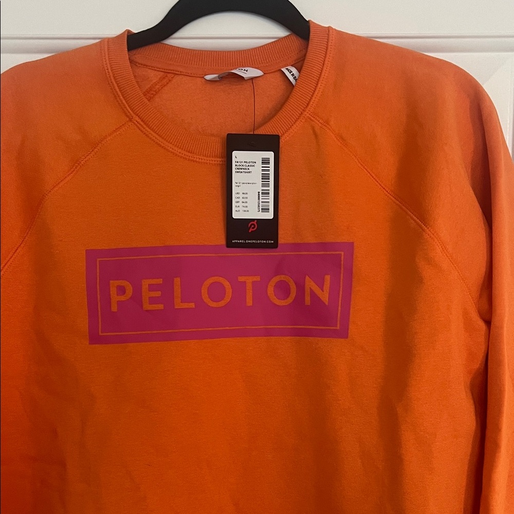 Peloton Vibrant Orange Crewneck with Pink Logo